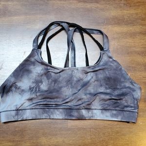 Black and grey tie-dye sports bra with strappy bac